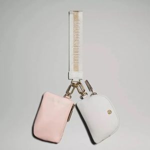 Lululemon Dual Pouch Wristlet in White Opal/Pink Mist/Gold Hardware